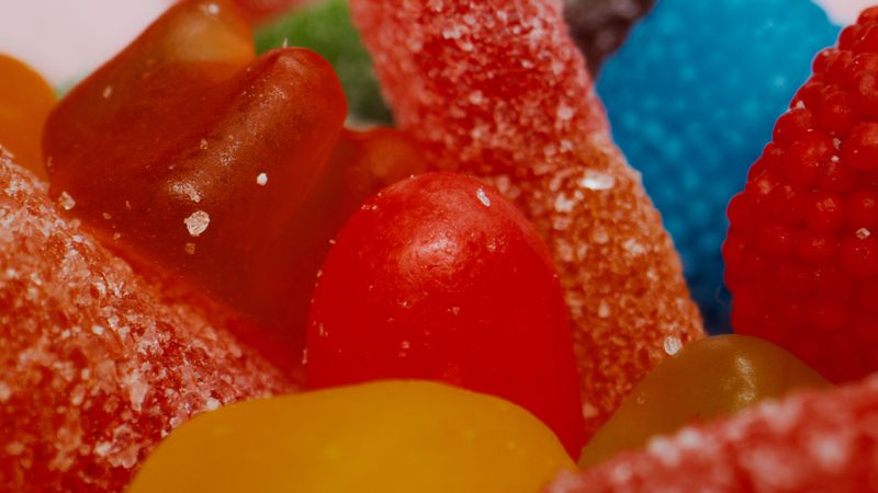 Close-up of colourful sugar-coated gummy sweets